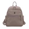 Mochila de color sólido para mujer, nueva mochila de tela de nailon ligera, de gran capacidad y de moda, mochila de viaje pequeña para mujer (2025)