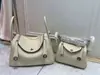 Capa Superior Piel de Vaca Togo Lindy Bolso de Piel Genuina para Mujer 2025 Nuevo Retro Europeo y Americano Bolso Cubo Moda Mano Bolso de Piel Genuina para Mujer