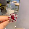 Agite o som do anel feminino mais vendido no exterior, micro diamante denier em forma de anel de zircônia corindo vermelho, simulação de contas coloridas no atacado