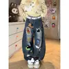Calça jeans larga de perna ampla até o chão com bordado de sabre de desenho animado Chao Li Youhuo para meninas, design de verão 2026