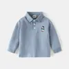 Camiseta de Manga Larga para Niños 2026 Primavera Nuevo Estilo Camisa Polo para Niños Top Básico con Cuello para Bebé Ropa Infantil de Moda Venta al por Mayor