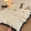 Juego de ropa de cama estilo francés para otoño e invierno, juego de cuatro piezas, funda de edredón de gasa de doble capa de algodón puro, sábana, protector de colchón, juego de tres piezas para dormitorio 44