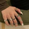 Nuevo anillo de cadena de moda europea y americana para mujer, estilo retro, apertura sencilla, joyería para parejas de estudiantes, joyería creativa con pegamento en forma de gota.