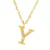 En Stock al por Mayor Colgante Alfabeto de 26 Letras con Diamantes de Acero Inoxidable Europeo y Americano Cadena para Clavícula Collar de Acero de Titanio para Mujeres