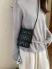 Moda Primavera/Verano 2026 Bolso Pequeño Calado de Cuero Suave Bolso de Hombro Mini Casual Bolso Cruzado para Teléfono de Color Sólido Tendencia