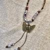 Nuevo collar con colgante de mariposa de cerámica retro de estilo chino para mujer 2023, nuevo estilo étnico de moda, accesorios de cadena de suéter largo