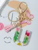 Suministros del Fabricante Llaveros con Flores Secas Prensadas 26 Letras del Alfabeto Inglés Llaveros con Borla de Mariposa Charms para Bolsos de Mujer