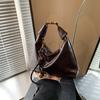 Bolsa Retro Bolinho Outono e Inverno para Mulheres 2026 Nova Versátil Casual Transversal Bolsa de Mão Pequena Tendência