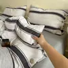 Juego de cuatro piezas de gasa de doble capa grado A, funda de edredón con botones, sábana plana y sábana bajera, algodón lavado liso, adecuado para dormitorios de estudiantes, juego de tres piezas