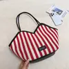 Bolsa Grande de Lona Listrada para Mulheres 2026 Nova Moda Color-Blocking Bolsa de Ombro Tote Bolsa de Braço Tendência Primavera e Verão para o Dia a Dia