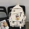 Mochila Escolar Snoopy Nova 2023 em Nylon para Meninos e Meninas Mochila Fashion Bolsa de Mão de Estudante com Bolsa Pingente