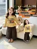 Conjunto de Primavera y Otoño para Niñas 2026 Nuevo Conjunto de Dos Piezas con Top de Dibujos Animados Elegante y Pantalones Anchos para Niña Tendencia
