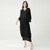 Traje de Primavera 2026 para Mujer de Miyake con un Diseño Único, Top tipo Camiseta de Nicho y Falda Ajustada a la Cadera, Conjunto de Dos Piezas a la Moda y con Estilo