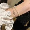 Pulseira de Zircônia Estrela de Quatro Pontas Ajustável para Mulheres, Design Versátil de Nicho, Luxo Leve, Empilhamento Personalizado, Joias de Alta Qualidade