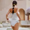 Fornecimento Exclusivo Transfronteiriço de Novo Conjunto de Roupa de Banho Feminina Três Peças: Regata Relaxada Sem Mangas Estilo Coreano, Calça Saia de Cintura Alta com Pernas Largas e Biquíni