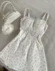 Vestido de Primavera 2026 Estilo Mori Girl Estampado Floral Tirantes Finos Ajustado Patchwork Cintura Alta Falda Corta Línea A Fresco y Dulce