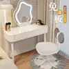 Nuevo modelo de tocador para dormitorio, mesa de maquillaje simple y moderna, gabinete de almacenamiento de lujo ligero, tocador pequeño estilo crema