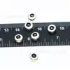 Al por mayor ojo de diablo de cuentas doradas y plateadas 6*8mm cuenta de ojo plana gota de aceite de doble cara agujero recto accesorios de joyería DIY dispersos
