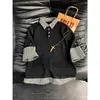 Camisa Polo Patchwork Xadrez Falsa de Duas Peças para Homem, Verão 2026, Camiseta Casual Solta de Manga Curta com Gola Reversível