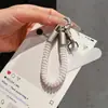 Cable de teléfono elástico colorido cordón para teléfono móvil muñeca llavero corto bolsa colgante resistente anti-pérdida estilo ins nuevo