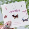Nuevos Aretes de Dibujos Animados de Kt Oreja de Gato Hueso Uñas Lindos Goteo de Aceite Kawaii Aretes Acero de Titanio Modernos Elegantes