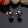Comercio electrónico transfronterizo comercio exterior fuentes de una generación de moda europea y americana personalidad calavera de diamante acero de titanio pendientes para hombre