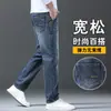 Jeans Masculino de Alta Qualidade 2026 Primavera e Outono Reto Solto Esticável Popular Versátil Calça Longa para Homens Jovens e de Meia-Idade Estilo Primavera e Outono