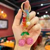Llavero Creativo y de Moda con Bloques de Color y Cuentas, Totalmente Cubierto de Pedrería, Diseño de Fresa 3D, Lindo y Dulce, Accesorio de Alto Valor para Bolsos de Niñas