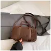 Bolsa de pelúcia, bolsa de mão clutch requintada de outono e inverno, nova bolsa Boston de lã de cordeiro 2026, bolsa transversal para mulheres