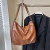 Bolsa Tote Feminina 2026 Nova Grande Capacidade Mochila para o Dia a Dia Casual Retrô Tendência de Rua Ombro Único Transversal
