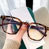 Nuevas gafas TR90 m con montura redonda y diseño de uñas, estilo retro, con patas de madera y antiluz azul, a juego para hombres y mujeres.