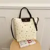 Otoño 2026 Nuevo Estilo Ins Bolso Versátil de Estrella Bolso de Compras de Moda de Gran Capacidad Bolsos para Mujer de Nicho al por Mayor