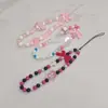 Cadena para teléfono móvil con cuentas de niña linda, cordón, flor acrílica, lazo, corazón con cuentas, funda de teléfono, adornos de cuentas de colores