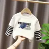 Camiseta base para niño 2026 nuevo modelo camiseta de manga larga a rayas patchwork para niños top de algodón puro otoño para niños mayores