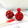 Pendientes de bola hueca de doble cara para mujer, versión coreana, con borlas, de fábrica directa de Yiwu, E1000, venta al por mayor