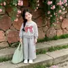Conjunto de Moletom com Capuz e Laço para Menina 2026 Primavera/Outono Estilo Doce Estilo Salty Conjunto Casual Esportivo de Duas Peças Roupas Infantis