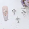 Novos acessórios de arte de unha em liga estilo japonês, luxo leve, cruz com incrustação de diamantes de metal, atacado