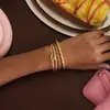 Diseño Silencioso y Elegante, Estilo Clásico Acero Inoxidable Oro 18K Diámetro del Alambre Cuerda Nudada Corazón Pulsera Abierta Joyería de Moda