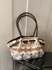 Bolso de Mano Portátil Nuevo Lindo Otoño/Invierno 2025 Bolso de Maquillaje de Moda Tendencia Bolso de Viaje Bolso de Hombro Simple de Nicho