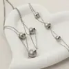 Joyería Popular de Venta Caliente Transfronteriza Tres Bolas de Acero Collar Pulsera de Acero de Titanio Joyería Personalizada Estilo Ins para Mujer Fábrica de Origen 1688
