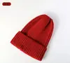 Sombrero de punto nuevo de rayas verticales con punta transfronterizo otoño e invierno cálido unisex versátil de dopamina color sólido sombrero de pareja