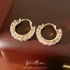 Aretes redondos geométricos de espiga de trigo incrustados con circonita, exquisitos y únicos, aretes de nicho con un sentido de lujo y sofisticación, al por mayor