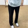 Pantalones de Hielo Negro Puro Seda Hombres 2026 Otoño Caída Pierna Recta Ajustada Casual Micro Acampanados Pantalones de Traje