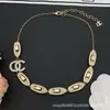 Collar Cruzado Chanel Doble C Nueva Colección, Auténtico con Etiquetas, Alta Calidad, Venta al por Mayor con Descuentos por Cantidad, Directo del Fabricante