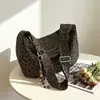 Bolsa tote de gran capacidad, bolsa versátil y elegante con forma de dumpling para mujer, nueva colección otoño 2026, bolso cruzado de un solo hombro casual y relajado
