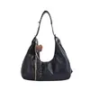 Bolso de axila para mujer 2026 retro de un solo hombro gran capacidad versátil para el día a día bandolera nuevo casual de alta gama bolso tipo bola de masa