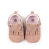 Zapatos nuevos para bebé con detalle de lazo y encaje, con cierre de velcro, suela de goma para agarre y diseño transpirable, perfectos para aprender a caminar