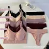 Conjunto de lencería femenina sin costuras con copas fijas, bralette push-up, tanga y sujetador reductor para busto grande con braguita plana al por mayor