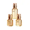 Set de botellas de vidrio ámbar estilo lujo con detalles en oro rosa, incluyendo botellas para loción y crema, y sérum antiedad - un producto de alta gama