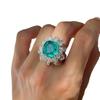 Anillo de dedo de imitación de esmeralda y girasol para mujer, de lujo, con diamantes y flor verde Paraiba, muy popular en verano.